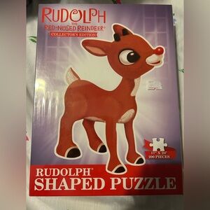 New in sealed box 200 pce Rudolph the Red Nosed Reindeer Collectors puzzle.